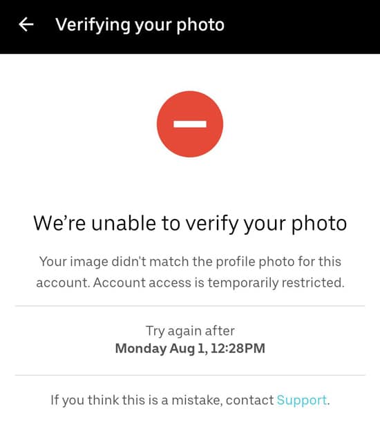An alert from Uber that the app could not verify a driver's photo