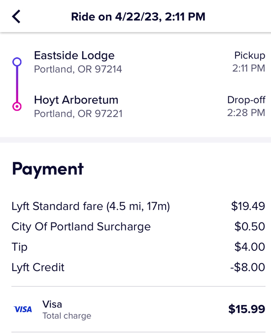 a lyft receipt that shows line item for lyft fare, service fee, and tip