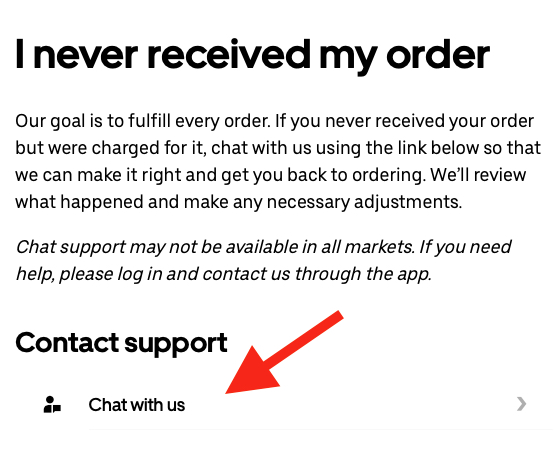 arrow on an Uber support page that points to a 'chat with us' button